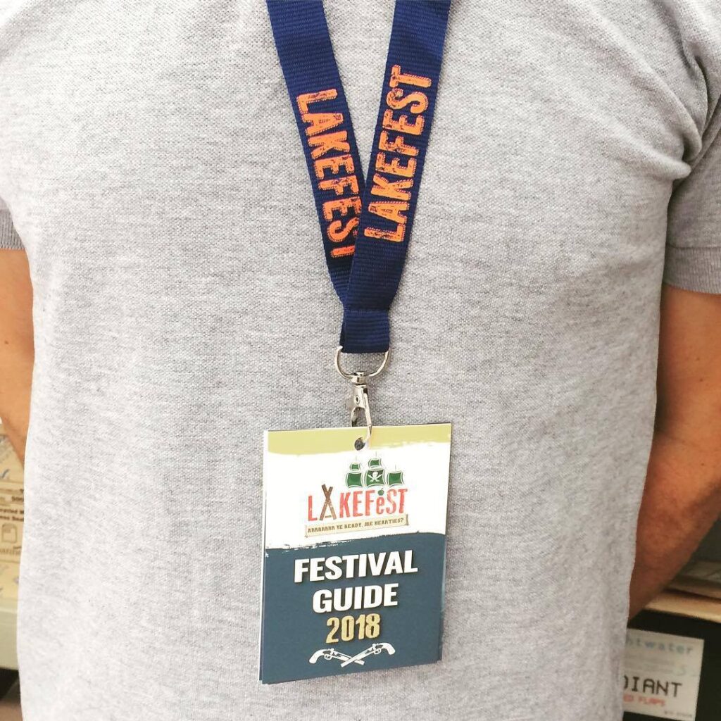 Man Wearing a Lakefest Festival Lanyard